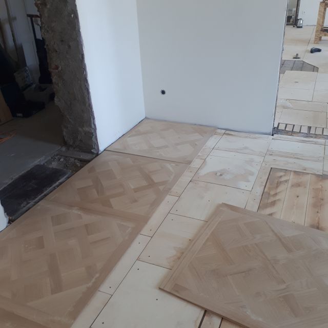 installation of wood flooring parquet tiles Renaissance Floor In-Lays